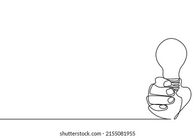a hand is holding a light bulb. a person finding new idea and creative solution background style concept