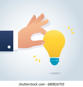 hand holding a light bulb vector, 