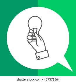 Hand holding lightbulb