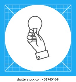 Hand holding lightbulb