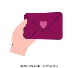 Hand holding a love letter.