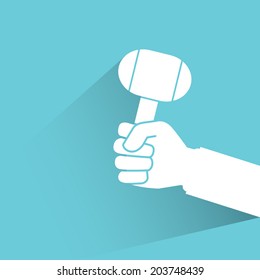hand holding lump hammer, blue background, flat and shadow theme