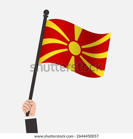 Hand Holding Macedonia Waving Flag