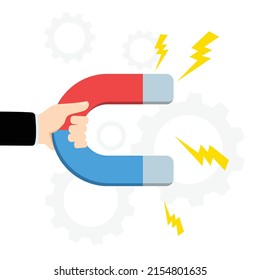 Hand holding magnet. Horseshoe magnet icon with lightning shaped attraction.