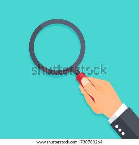 Hand holding a magnifying glass. Flat style - stock vector.