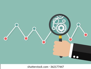 Cristal de aumento manual con gráfico del mercado de valores. Análisis de datos