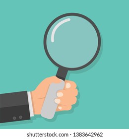 hand holding Magnifying glass vector