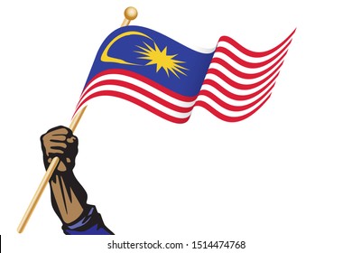 The hand holding the Malaysia flag.