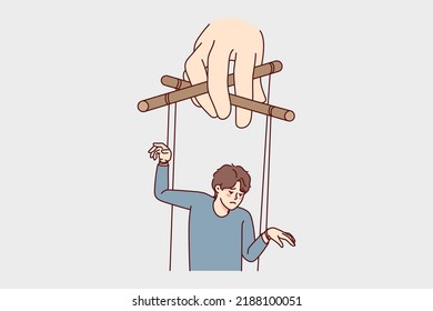 Hand holding man on ropes manipulating steps and actions. Puppeteer control unhappy guy. Manipulation and lack of freedom. Vector illustration. 