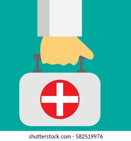 Hand holding medical case