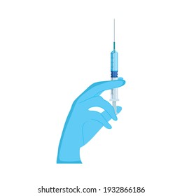 hand holding a medical syringe