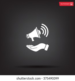 hand holding megaphone