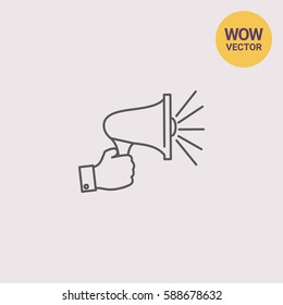 Hand holding megaphone