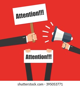 Hand holding megaphone - Attention