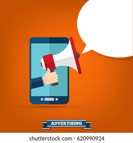 Hand holding megaphone with bubble speech - mobile phone advertising concept 