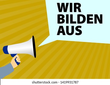 hand holding megaphone or bullhorn with speech bubble and text WIR BILDEN AUS, German for WE TRAIN APPRENTICES