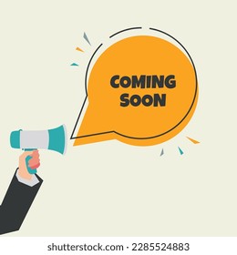 Hand holding megaphone with COMING SOON speech bubble vector illustration