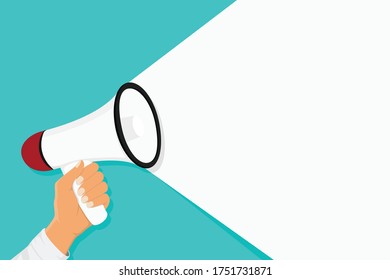 Hand holding megaphone on blue background with copy space. Digital marketing, social media marketing concept.