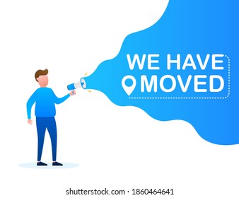 Hand holding megaphone - We have moved. Vector stock illustration.