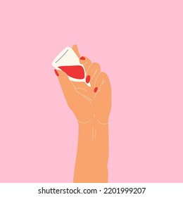 Hand holding a menstrual cup. Vector. All elements are isolated