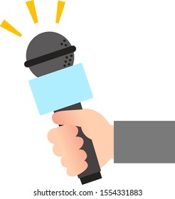 Hand holding a microphone for interview