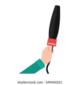 hand holding microphone with irregular grid