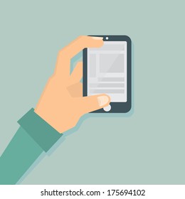 Hand holding a mobile phone