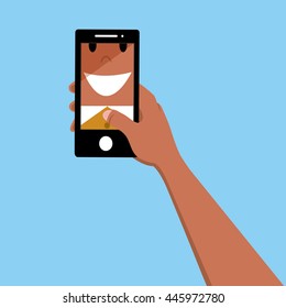 Hand holding mobile phone