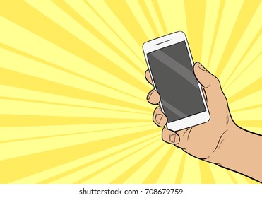 Hand holding mobile phone. Comics style.Pop art vector illustration.