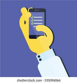 Hand holding mobile phone. To do list apps.  Check list apps. The Art of Time Management
