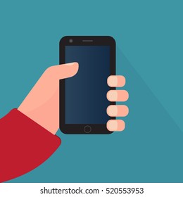 Hand holding mobile phone in flat design style. Vector illustration