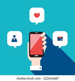 Hand holding mobile phone with icons and speech bubbles. Communication in the network concept. Vector illustration