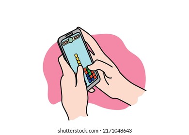 Hand holding a mobile phone playing puzzle game. Flat design