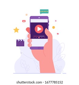 Hand holding mobile phone using and watching streaming service with clapper. Streaming cinema concept. Concept of video marketing, online cinema. Vector illustration for UI, web banner, mobile app