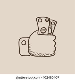 Hand holding money sketch icon.
