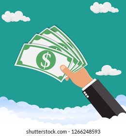 Hand holding money.The hand is holding money in the sky. Vector illustration.