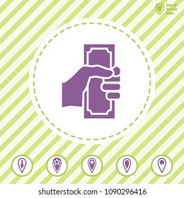Hand holding money vector icon. Illustration on a  Flat design style