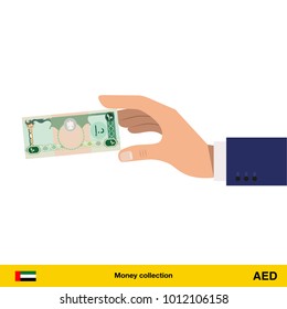 Hand holding money vector illustration. Dirham banknote.