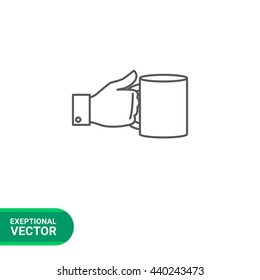 Hand holding mug