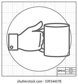 Hand holding mug