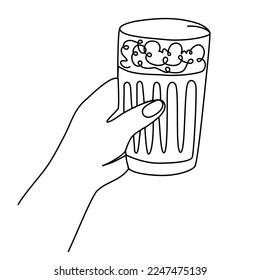 Hand holding mug beer