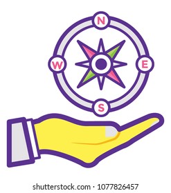 
Hand holding navigational compass 
