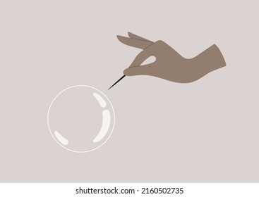 A hand holding a needle next to a soap bubble