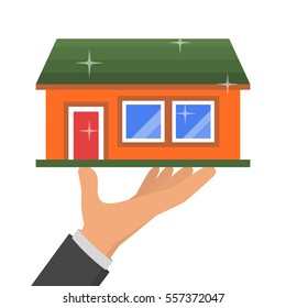 Hand holding new house, vector illustration