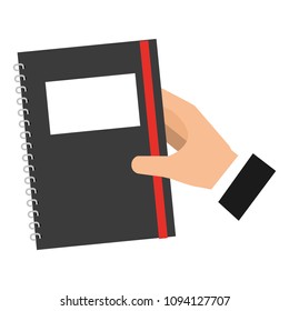hand holding notebook supply image