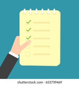 Hand holding notepad checklist. Vector illustration isolated on background