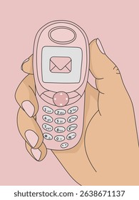 Hand holding old pink mobile phone