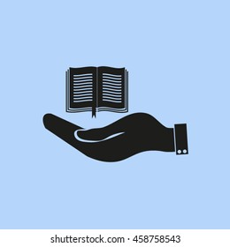 hand holding a open book
