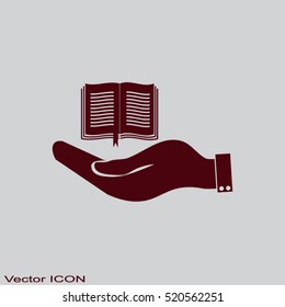 hand holding a open book