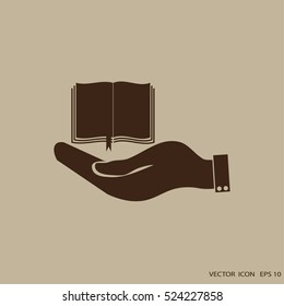 hand holding a open book